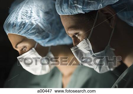 Medical personnel in operating room View Large Photo Image Stock Photo - Medical personnel in operating room. Fotosearch