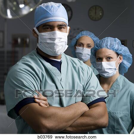 Stock Photo - Medical personnel in surgery. Fotosearch