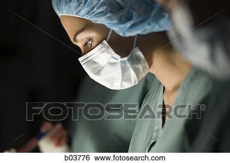 Medical personnel in surgery View Large Photo Image Stock Photograph - Medical personnel in surgery. Fotosearch