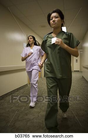 Stock Photography - Medical personnel running. Fotosearch
