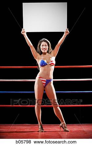 Model with a blank sign in a boxing ring View Large Photo Image Stock Photo - Model with a blank sign in a boxing ring. Fotosearch