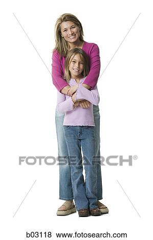 Mother embracing daughter View Large Photo Image Stock Photo - Mother embracing daughter. Fotosearch