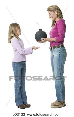 Mother handing bomb to daughter View Large Photo Image Stock Image - Mother handing bomb to daughter. Fotosearch
