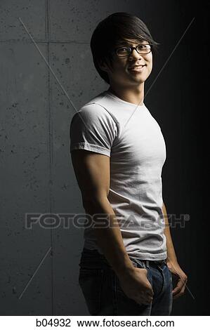 Muscular man with eyeglasses smiling View Large Photo Image Stock Image - Muscular man with eyeglasses smiling. Fotosearch