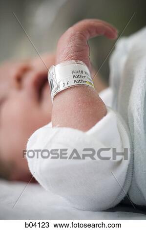 Stock Image - Newborn baby closeup. Fotosearch