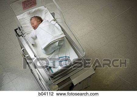 Newborn girl in incubator aerial View Large Photo Image Stock Image - Newborn girl in incubator aerial. Fotosearch