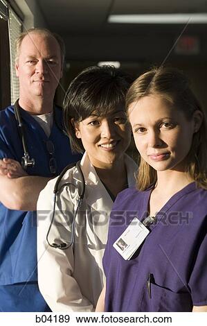 Nurse and doctors posing View Large Photo Image Stock Photo - Nurse and doctors posing. Fotosearch