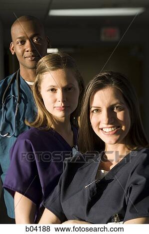 Nurses and doctor posing View Large Photo Image Stock Photo - Nurses and doctor posing. Fotosearch