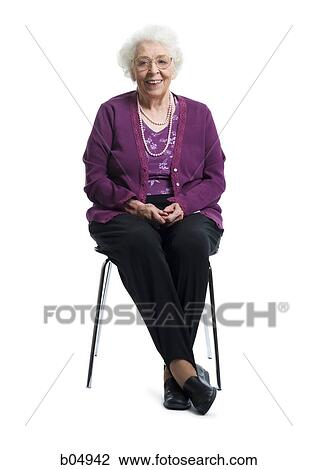 Older Woman sitting and smiling View Large Photo Image Stock Image - Older Woman sitting and smiling. Fotosearch