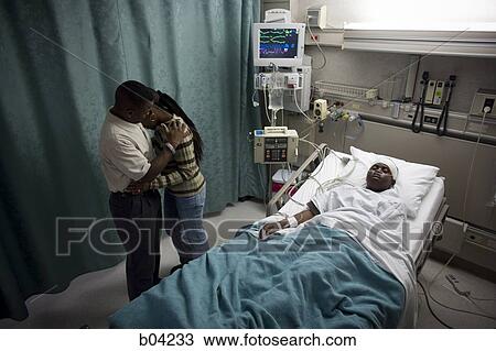 Parents with boy in hospital bed wearing head bandages View Large Photo Image Stock Image - Parents with boy in hospital bed wearing head bandages. Fotosearch