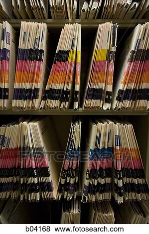 Stock Photo - Patient records in folders. Fotosearch