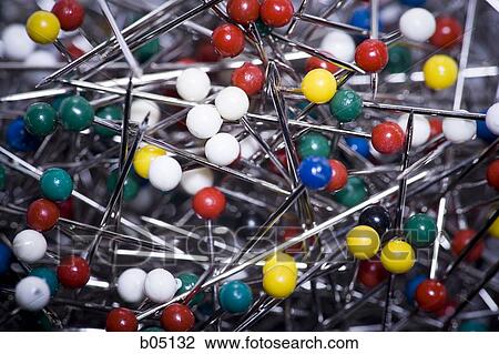 Stock Image - Pile of multicoloured pins. Fotosearch