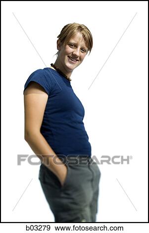 Stock Photo - Portait of woman with hands in pockets. Fotosearch
