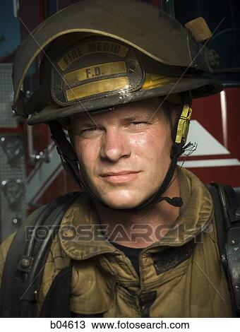 Stock Image - Portrait of a firefighter. Fotosearch
