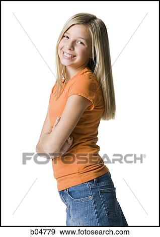 Portrait of a girl smiling with arms crossed View Large Photo Image Stock Photo - Portrait of a girl smiling with arms crossed. Fotosearch