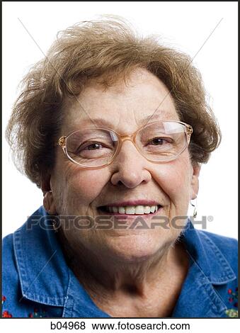 Portrait of a mature woman smiling View Large Photo Image Stock Photo - Portrait of a mature woman smiling. Fotosearch