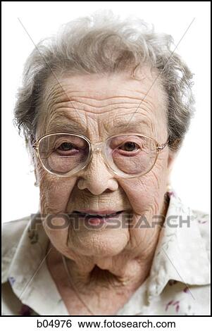 Portrait of a mature woman smiling View Large Photo Image Stock Photograph - Portrait of a mature woman smiling. Fotosearch