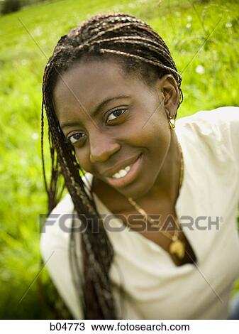 Stock Image - Portrait of a woman outdoors. Fotosearch