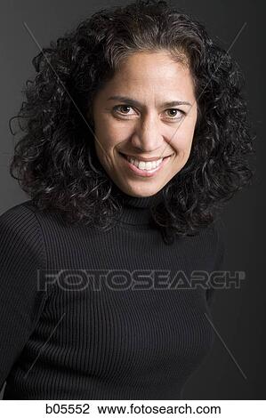 Portrait of a woman smiling View Large Photo Image Stock Image - Portrait of a woman smiling. Fotosearch