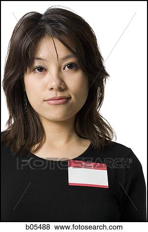 Portrait of a woman with blank name tag View Large Photo Image Stock Photo - Portrait of a woman with blank name tag. Fotosearch
