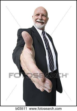 Portrait of businessman with outstretched hand View Large Photo Image Stock Image - Portrait of businessman with outstretched hand. Fotosearch