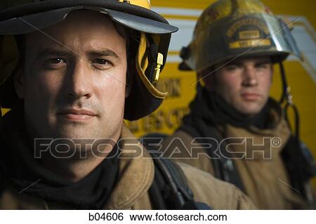 Stock Photograph - Portrait of firefighters. Fotosearch