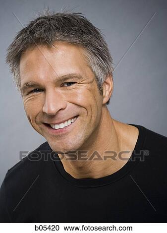 Portrait of mature man smiling View Large Photo Image Stock Image - Portrait of mature man smiling. Fotosearch