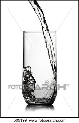 Pouring water into a glass View Large Photo Image Stock Photo - Pouring water into a glass. Fotosearch