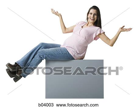 Pregnant woman sitting on blank sign View Large Photo Image Stock Image - Pregnant woman sitting on blank sign. Fotosearch