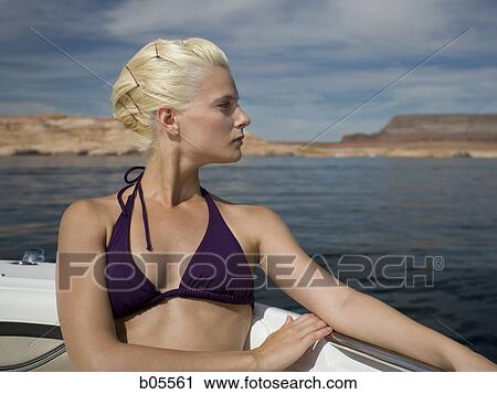 Profile of woman in bikini on boat View Large Photo Image Stock Image - Profile of woman in bikini on boat. Fotosearch