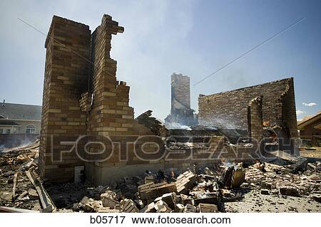 Stock Photo - Remnants of a burned down house. Fotosearch