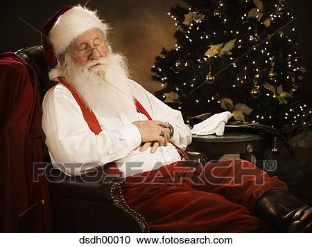 Santa Claus sitting down View Large Photo Image Stock Image - Santa Claus sitting down. Fotosearch