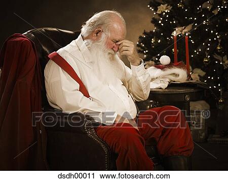 Santa Claus sitting down View Large Photo Image Stock Image - Santa Claus sitting down. Fotosearch