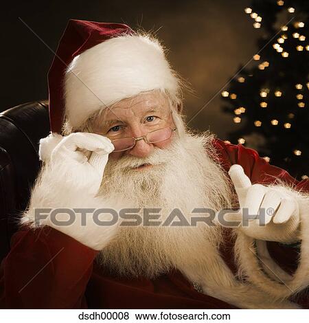 Santa Claus sitting down View Large Photo Image Stock Photo - Santa Claus sitting down. Fotosearch