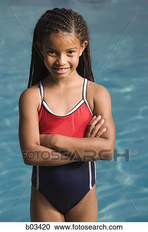 Smiling girl by pool View Large Photo Image Stock Image - Smiling girl by pool. Fotosearch