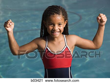 Smiling girl by pool View Large Photo Image Stock Image - Smiling girl by pool. Fotosearch