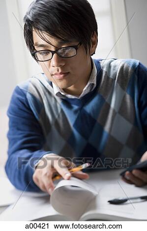 Student concentrating and studying View Large Photo Image Stock Image - Student concentrating and studying. Fotosearch