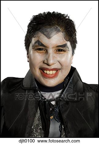 Stock Image - Teenage Boy dressed as Dracula. Fotosearch