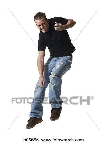 Stock Photograph - Teenage boy jumping. Fotosearch