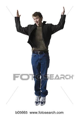 Stock Photography - Teenage boy jumping. Fotosearch