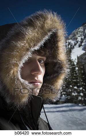 Teenage boy outside in the snow View Large Photo Image Stock Image - Teenage boy outside in the snow. Fotosearch