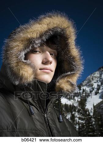 Teenage boy outside in the snow View Large Photo Image Stock Image - Teenage boy outside in the snow. Fotosearch