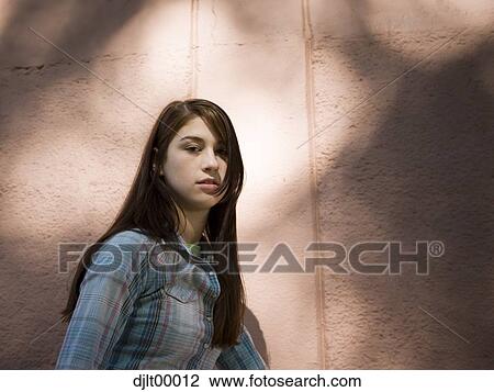Teenage girl in shadows View Large Photo Image Stock Image - Teenage girl in shadows. Fotosearch