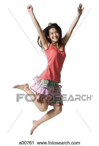 Teenage girl jumping View Large Photo Image Stock Image - Teenage girl jumping. Fotosearch