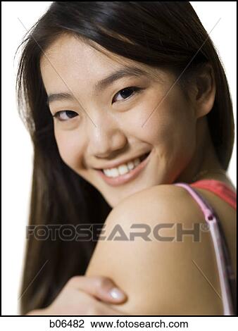 Teenage girl smiling View Large Photo Image Stock Image - Teenage girl smiling. Fotosearch