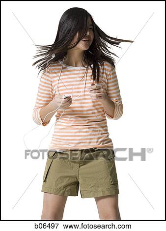 Teenage girl with an MP3 player View Large Photo Image Stock Photo - Teenage girl with an MP3 player. Fotosearch