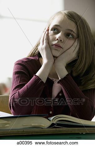 Teenage girl with hands on chin View Large Photo Image Stock Photography - Teenage girl with hands on chin. Fotosearch