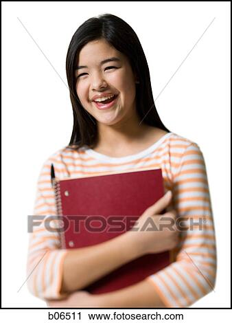 Teenage girl with notebooks View Large Photo Image Stock Image - Teenage girl with notebooks. Fotosearch