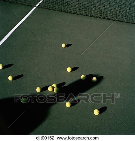 Tennis balls on a court View Large Photo Image Stock Image - Tennis balls on a court. Fotosearch