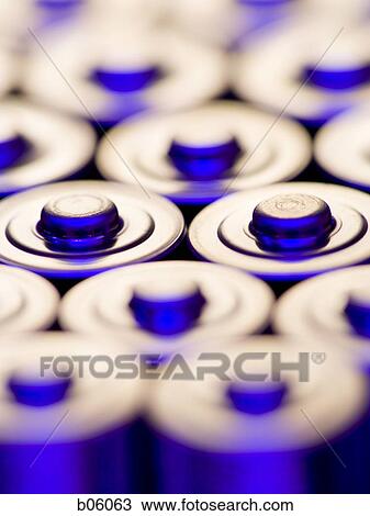 The tops of alkaline batteries View Large Photo Image Stock Image - The tops of alkaline batteries. Fotosearch